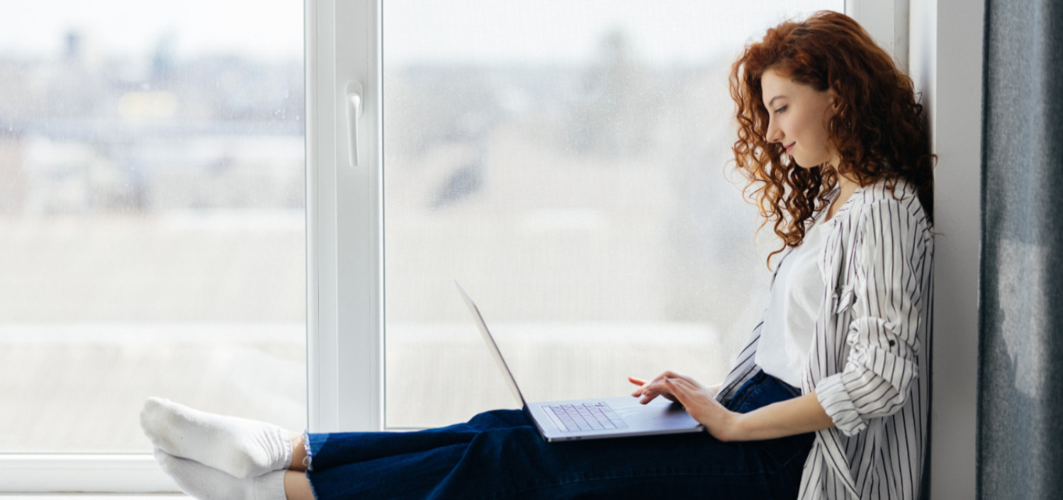 beautiful-positive-woman-using-laptop-sitting-windowsill-city-apartment-young-redhaired-woman-working-home-freelance-concept.jpg (1.99 MB)